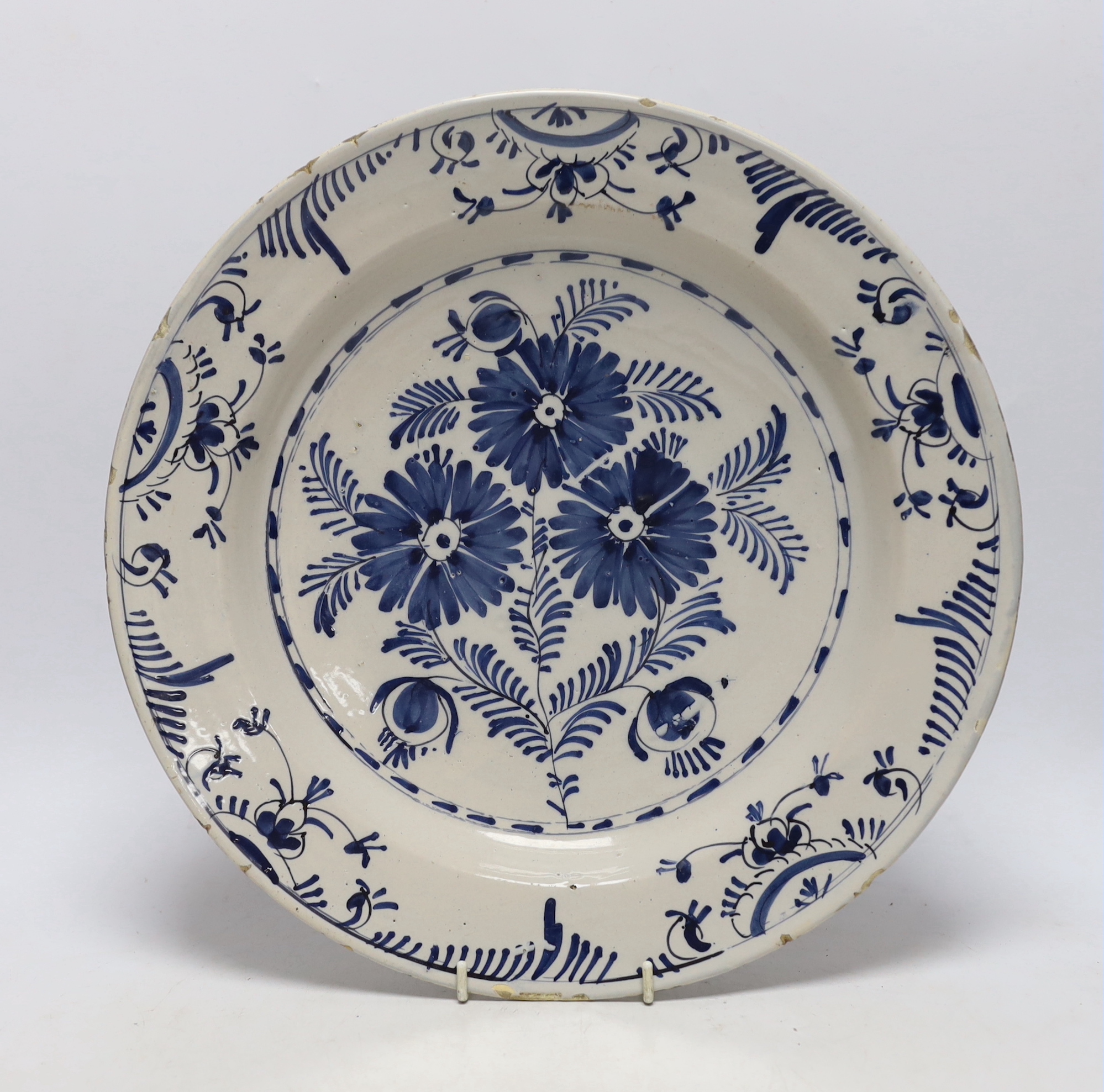 A late 18th century blue and white Delft charger, 34.5cm